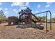 Community playground featuring climbing structures, slides, and swings for active recreation and fun in a secure environment at 13422 Willow Bluestar Loop, Riverview, FL 33579