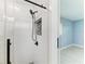 Sleek shower with a black showerhead and unique mosaic tile accents, creating a spa-like experience at 1364 Westport Ln # 1403, Sarasota, FL 34232