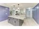 Spacious kitchen with a large center island, stainless steel appliances and a modern design at 1364 Westport Ln # 1403, Sarasota, FL 34232