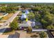 Home aerial showcasing a screened-in lanai for outdoor entertaining at 1434 Beacon Dr, Port Charlotte, FL 33952