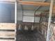 Interior of barn with partial stalls, metal roof and open to the outdoors at 15308 Fruitville Rd, Sarasota, FL 34240