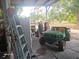 Barn with a tractor, ladder, tools, and refrigerator at 15308 Fruitville Rd, Sarasota, FL 34240
