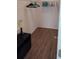 Walk in closet with rod and shelving, and light laminate floor at 15308 Fruitville Rd, Sarasota, FL 34240