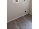 A designated laundry area with hookups, connections and modern laminate flooring at 15308 Fruitville Rd, Sarasota, FL 34240