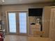 Living room with tile floors and a TV at 15308 Fruitville Rd, Sarasota, FL 34240