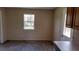 Bright living room with a window and new wood laminate flooring at 15308 Fruitville Rd, Sarasota, FL 34240