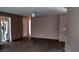 Spacious living room with laminate flooring and ample natural light at 15308 Fruitville Rd, Sarasota, FL 34240