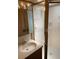 RV bathroom with sink, cabinet, and glass shower at 15308 Fruitville Rd, Sarasota, FL 34240