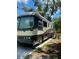 Spacious RV with exterior details and convenient access steps at 15308 Fruitville Rd, Sarasota, FL 34240