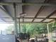 View of a storage area with open roof and beams at 15308 Fruitville Rd, Sarasota, FL 34240