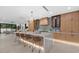 Bright, open kitchen featuring a large island with seating and modern cabinetry at 1559 Bay Rd, Sarasota, FL 34239