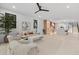 Open concept living room and kitchen with contemporary furnishings and ample natural light at 1559 Bay Rd, Sarasota, FL 34239