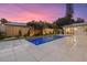 Relaxing pool with inset spa, featuring a spacious patio and private fenced yard at 1559 Bay Rd, Sarasota, FL 34239