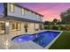 Beautiful pool and spa surrounded by manicured landscaping offering a serene outdoor living space at 1559 Bay Rd, Sarasota, FL 34239
