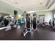 Well-equipped gym with modern machines, exercise balls, and ample space for a complete workout routine at 16614 Berwick Ter, Lakewood Ranch, FL 34202