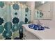 Bathroom vanity featuring a floral shower curtain, matching vessel sink, and decorative mirror frame at 1722 Hazelwood St, Sarasota, FL 34231