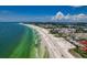 Scenic beach coastline with soft, pale sand and turquoise ocean, highlighting its picturesque beauty at 1722 Hazelwood St, Sarasota, FL 34231