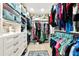 Spacious walk-in closet featuring custom organization solutions and ample storage at 1722 Hazelwood St, Sarasota, FL 34231