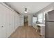 Office space with white desk, large closet and lots of natural light at 1722 Hazelwood St, Sarasota, FL 34231
