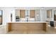Kitchen with large island, ample cabinet space, stainless steel appliances at 2249 Oak Terrace Ter, Sarasota, FL 34231