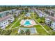 Aerial view of community's pool, shuffleboard, and complex at 2321 Canal Dr # F25, Bradenton, FL 34207