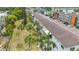 Aerial view of the community features lush greenery, and manicured lawns around the multi-unit condo building at 2321 Canal Dr # F25, Bradenton, FL 34207