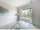 Comfortable living room with access to a private balcony at 2321 Canal Dr # F25, Bradenton, FL 34207