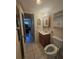 Cozy bathroom featuring a wood vanity and ceramic tile flooring at 2321 Canal Dr # F25, Bradenton, FL 34207