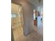 Standard bathroom featuring a shower-tub combo and tile flooring at 2321 Canal Dr # F25, Bradenton, FL 34207