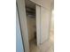 Storage closet with sliding doors and shelves at 2321 Canal Dr # F25, Bradenton, FL 34207