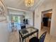 Open concept dining and living space with access to balcony and kitchen at 2321 Canal Dr # F25, Bradenton, FL 34207