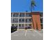 Low angle exterior view of condo building with unit F marked in orange at 2321 Canal Dr # F25, Bradenton, FL 34207