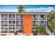 Condominium exterior displaying unit balconies, and assigned parking spaces at 2321 Canal Dr # F25, Bradenton, FL 34207