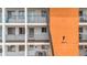 Close up exterior view of condo building featuring walkways, balconies, and Unit markings at 2321 Canal Dr # F25, Bradenton, FL 34207