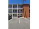 Unit F condo exterior with patio seating and designated parking space at 2321 Canal Dr # F25, Bradenton, FL 34207
