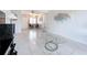 Spacious living room featuring tile floors and a combined dining area at 2321 Canal Dr # F25, Bradenton, FL 34207