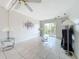 Well-lit living room with access to the balcony and showcasing modern decor at 2321 Canal Dr # F25, Bradenton, FL 34207