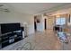 The living room offers an open layout with tile flooring and ample natural light at 2321 Canal Dr # F25, Bradenton, FL 34207