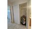 Water heater in closet with sliding door and shelving at 2321 Canal Dr # F25, Bradenton, FL 34207