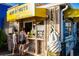 Quaint food kiosk offering mini donuts, coffee, and ice cream, inviting customers to enjoy a treat at 2435 Terry Ln, Sarasota, FL 34231