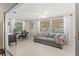 Relaxing living room with lots of natural light, neutral walls, and comfortable couch at 2435 Terry Ln, Sarasota, FL 34231