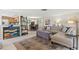 Open-concept living room seamlessly connects the living area to the dining space at 2435 Terry Ln, Sarasota, FL 34231