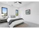 Modern bedroom featuring a stylish bed, contemporary decor, and bright windows at 2554 Arlington St, Sarasota, FL 34239