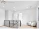 Second floor bonus room with neutral decor and railings at 2554 Arlington St, Sarasota, FL 34239
