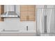 Modern kitchen featuring stainless steel appliances, wood cabinets and light countertops at 2554 Arlington St, Sarasota, FL 34239