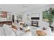 Bright living room featuring modern furniture, sleek bar area, and lots of natural light at 2554 Arlington St, Sarasota, FL 34239