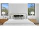 Bright main bedroom featuring a plush upholstered headboard and views to the outside at 2554 Arlington St, Sarasota, FL 34239