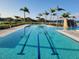 Inviting lap pool features clear water, lane markers, and a serene environment for fitness and recreation at 26017 Seastone Dr, Englewood, FL 34223
