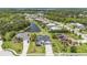 Wide aerial view of the neighborhood and water features at 3015 160Th E Ter, Parrish, FL 34219