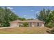 Charming single-story home with a well-maintained lawn and attached two-car garage at 3204 Pericles Ave, North Port, FL 34286
